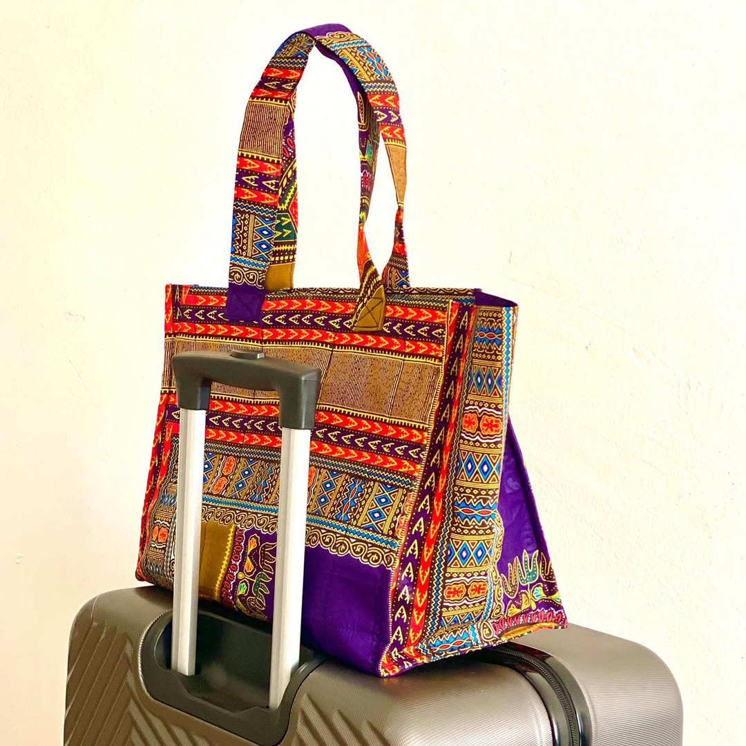 Travel bag with trolley sleeve